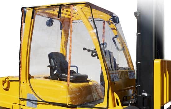 Clear polycarbonate forklift windshield installed on outdoor forklift